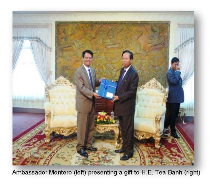 Presentation of gift of H.E. Tea Banh MND